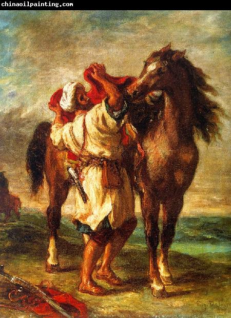 Eugene Delacroix Arab Saddling his Horse