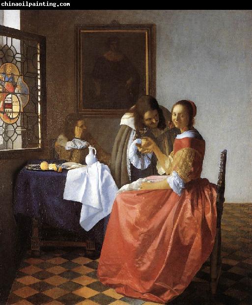 Jan Vermeer A Lady and Two Gentlemen