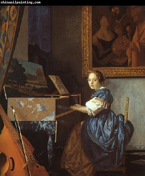 JanVermeer A Young Woman Seated at a Virginal