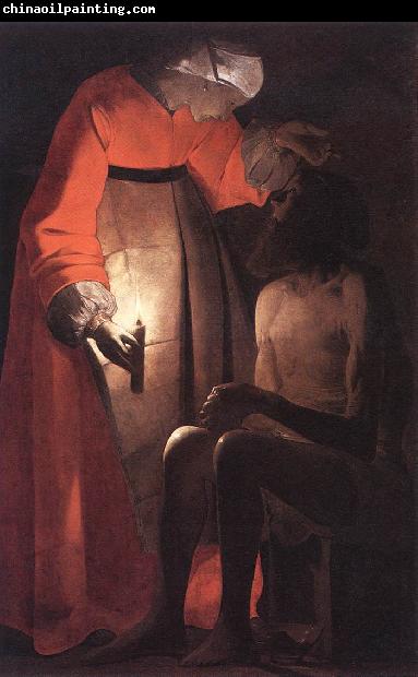 LA TOUR, Georges de Woman Catching Fleas