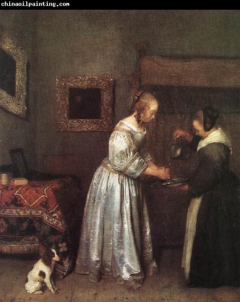 TERBORCH, Gerard Woman Washing Hands st