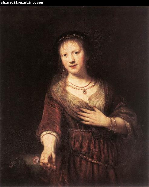 REMBRANDT Harmenszoon van Rijn Portrait of Saskia with a Flower