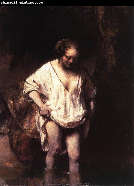 REMBRANDT Harmenszoon van Rijn Hendrickje Bathing in a River