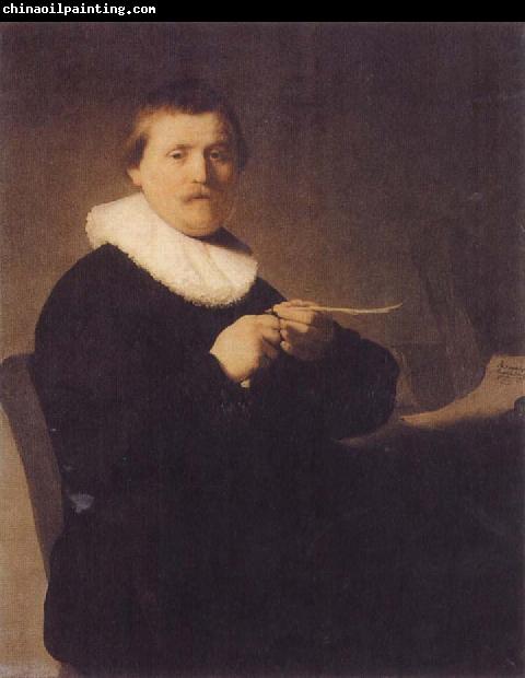 REMBRANDT Harmenszoon van Rijn Young Man Sharpening a Pen