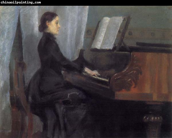 William Stott of Oldham CMS at the Piano