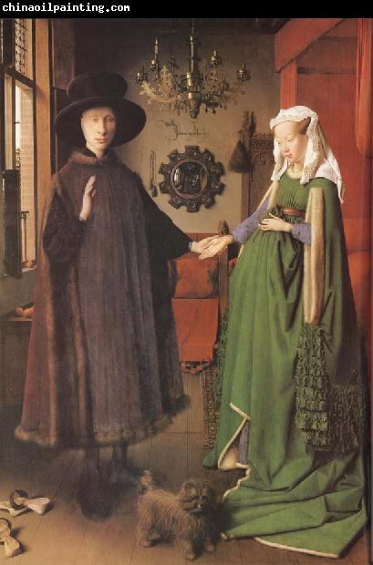 Jan Van Eyck Giovanni Arnolfini and his Bride