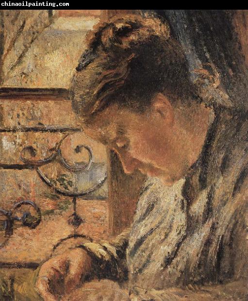 Camille Pissarro The Woman is sewing in front of the window