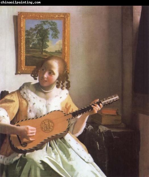 Jan Vermeer Woman is playing Guitar