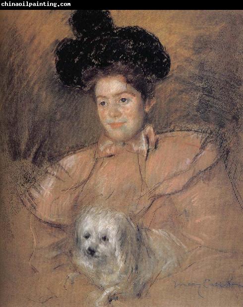 Mary Cassatt The girl holding the dog