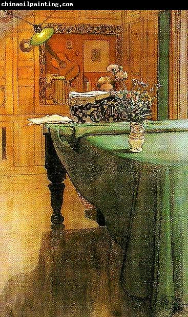 Carl Larsson brita vid pianot-aftonbelysning vid pianot