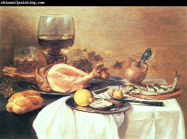 Pieter Claesz A ham, a herring, oysters, a lemon, bread, onions, grapes and a roemer