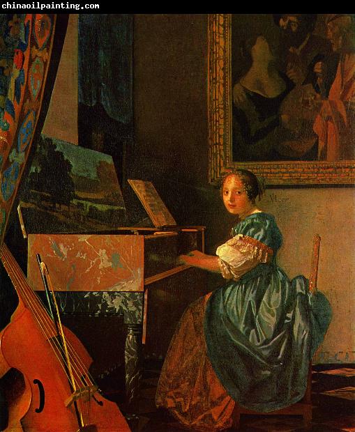 Johannes Vermeer A Lady Seated at a Virginal