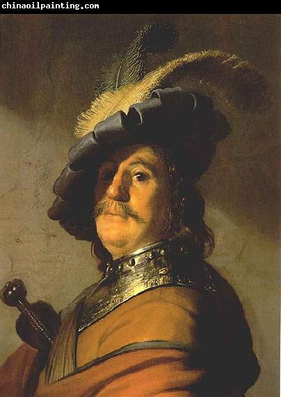 Rembrandt van rijn Bust of a man in a gorget and a feathered beret.