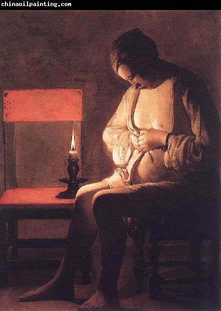 LA TOUR, Georges de Woman Catching Fleas