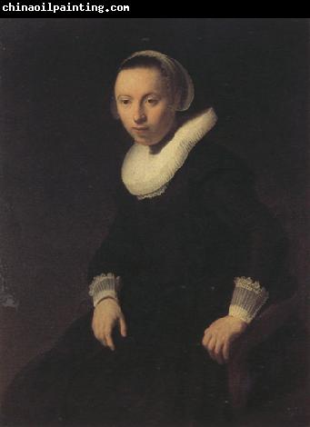 REMBRANDT Harmenszoon van Rijn Portrait of a young woman seted, (mk330